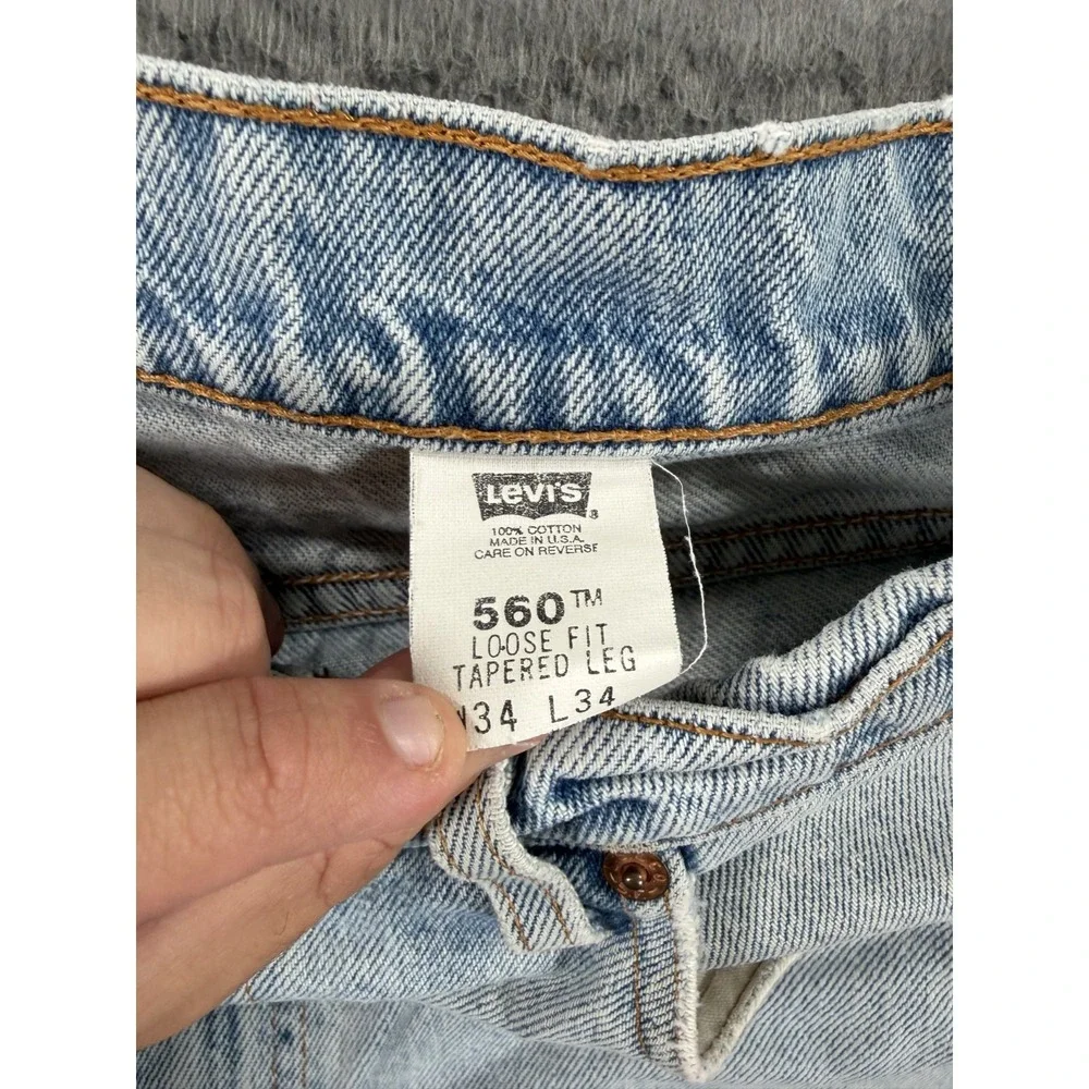 Vintage Levi's 560 Loose Fit Straight Leg Jeans Men 32x33 Distressed Grunge 1997